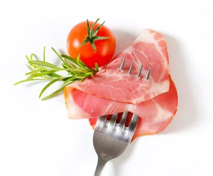 Fresh ham slices with cherry tomato and rosemary Stock Photos