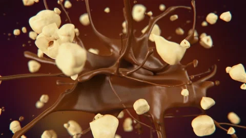 Fresh hazelnuts bursting in liquid chocolate in slow motion 4K Video stock 170666590