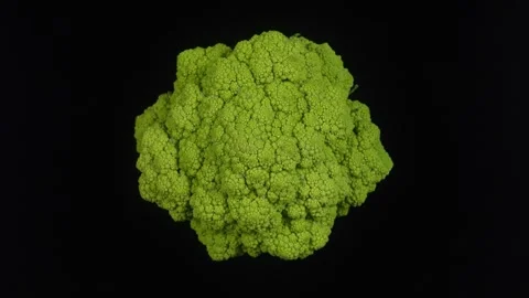 Fresh Head Of Cauliflower On Black Background. Stock Footage 312236264