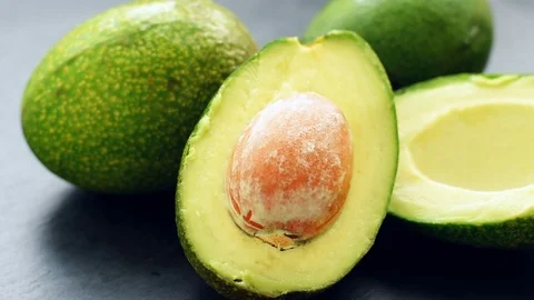 Fresh healthy avocado on a table Stock Footage 71347349