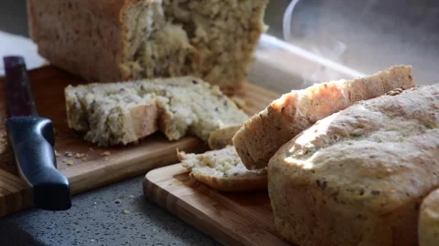 Fresh home made baked bread, whole grain organic food, hot steaming food Video stock 260276747