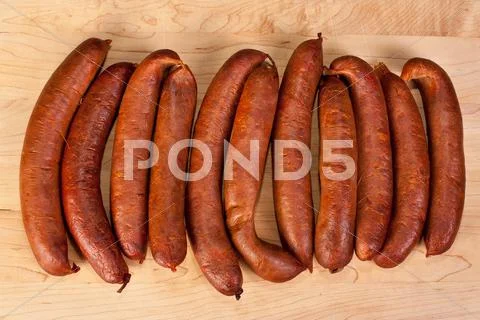 Fresh home made smoked sausages Stock Photos