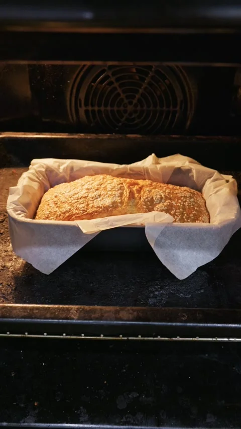 Fresh Homemade Rustic Bread Loaf Baking Inside Dark Kitchen Oven Stock Footage 334114772