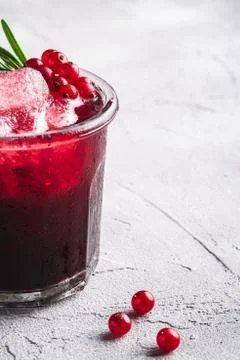 Fresh ice cold fruit cocktail in glass, refreshing summer red currant berries Stock Photos