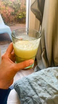 Fresh Juice in Hand Stock Photos