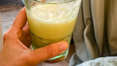 Fresh Juice in Hand Stock Photos