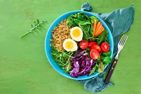 Fresh juicy and crusty buddha bowl healthy meal with quinoa and green sprouts Stock Photos