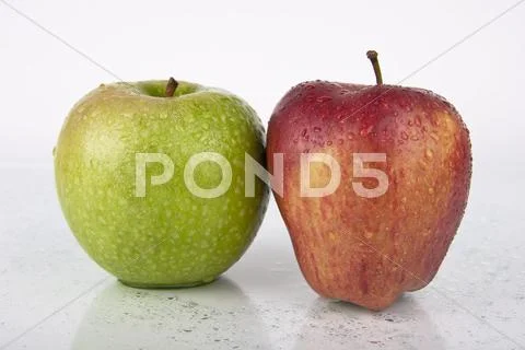 Fresh Juicy Apples on white Stock Photos