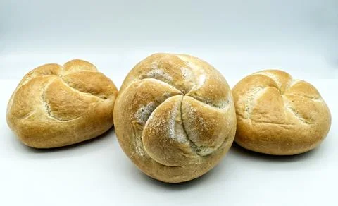 Fresh Kaiser rolls baked bread. Stock Photos