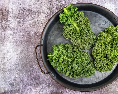 Fresh kale leaf salad on the table. Flat lay  Stock Photos