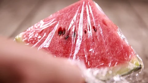 Fresh keeping of watermelon wrapped with plastic wrap (1) Stock Footage 202154542
