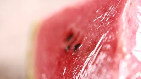 Fresh keeping of watermelon wrapped with plastic wrap (4) Stock Footage 202154543