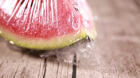 Fresh keeping of watermelon wrapped with plastic wrap (5) Stock Footage 202154545