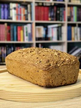 Fresh Keto Seed Bread Loaf Displayed on Wooden Board Stock Photos