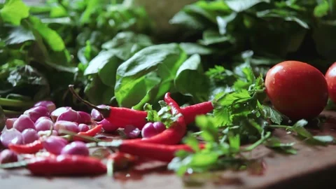 Fresh Kitchen Ingredients Red Chili Peppers Shallots and Tomatoes Close Up 스톡 동영상 339430696
