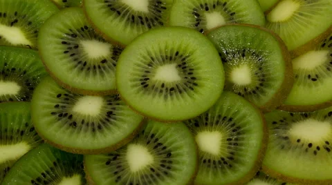 Fresh Kiwi Slices Close-up Rotating. Stock Footage 61409281