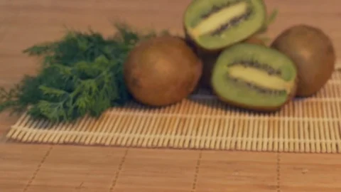 Fresh Kiwi on the Table Stock Footage 74160465