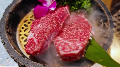 Fresh Kobe Wagyu beef raw sliced with marbled texture. 動画素材 340649115