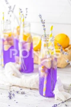 Fresh lavender violet cocktail with lemon and ice Stock Photos
