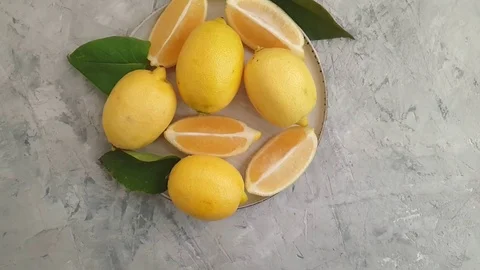 Fresh lemon on concrete background, slow motion Stock Footage 120174862