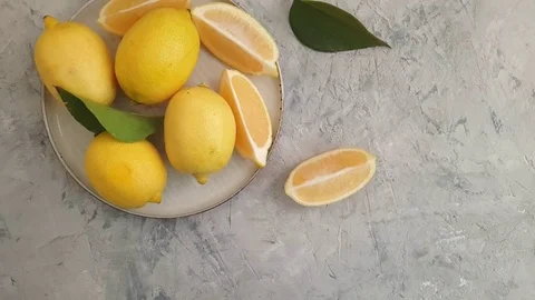 Fresh lemon on concrete background, slow motion Stock Footage 120174870