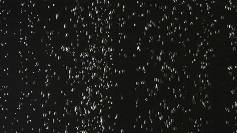 Fresh lemon falling into the water on black background. Citrus in water with 库存影片 111412835