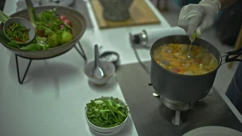 Fresh lemon juice will make the Tom Yum soup taste so much better. Stock Footage 161074518