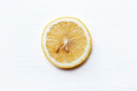 Fresh lemon slice  on  white. Stock Photos