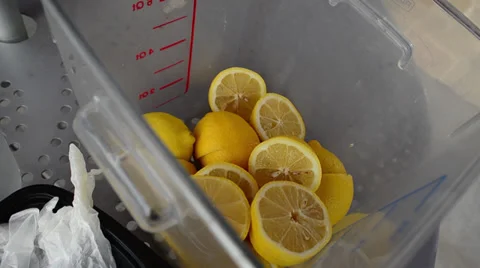 Fresh Lemonade in the making Stock Footage 36783536