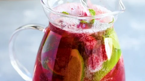 Fresh lemonade with raspberry, mint and lime Stock Footage 92262545