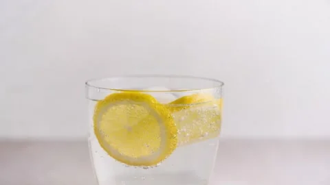 Fresh Lemonade with Soda Bubbles and Ice Cubes Stock Footage 331519615