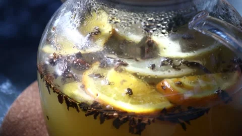 Fresh lemons and water in a pitcher, perfect for a refreshing drink Stock Footage 342430968