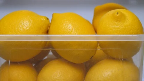 Fresh lemons background. Lemons ready to use. Organic food, fruits. Detox drink Video stock 102873004