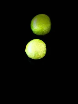 Fresh Lemons on a Black Background Stock Photos