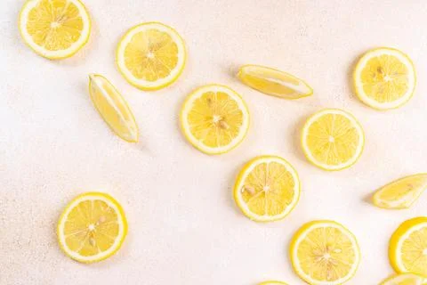 Fresh lemons on bright background. Lemon fruit citrus. Composition with who.. Stock Photos