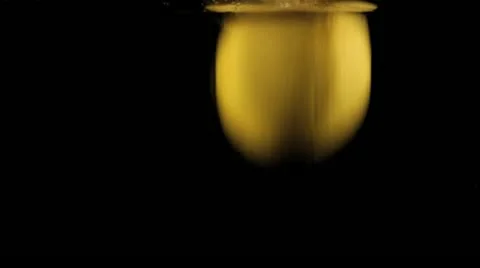 Fresh Lemons Falling in Water slow motion Stock Footage 11863337