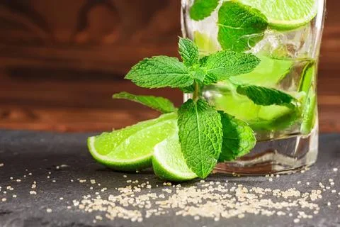 Fresh lime and mint drink with ice in a glass Stock Photos