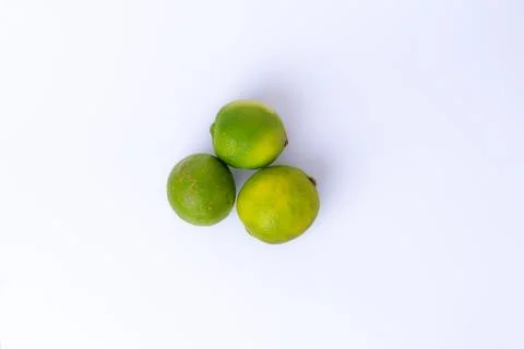 Fresh lime fruit isolated on white background. Stock Photos