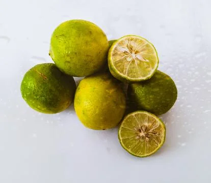 Fresh lime on a white background. Stock Photos
