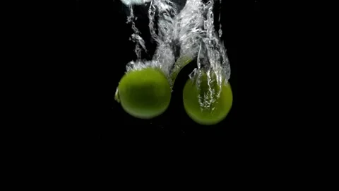 Fresh Limes Falling Into Water Video stock 132335681