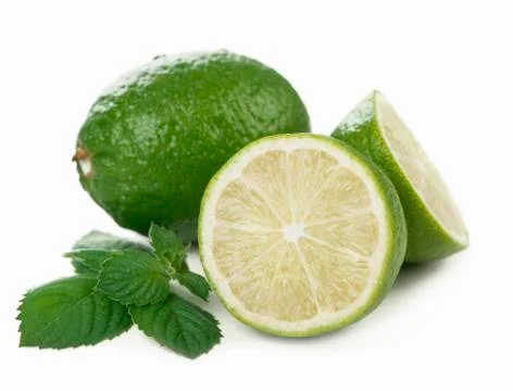 Fresh limes, mint leaves Stock Photos