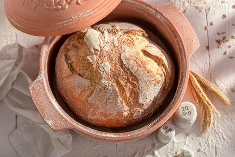 Fresh loaf of bread baked in a baking mold. Stock Photos