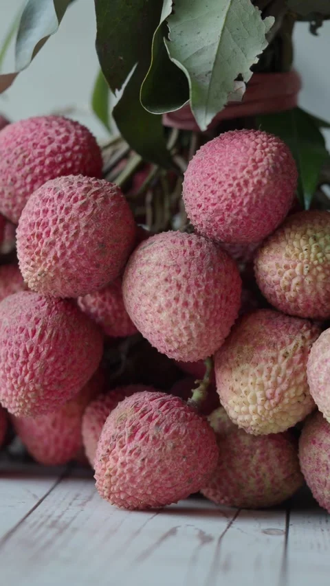 Fresh lychee fruit in a close-up view from a market Stock Footage 336227036