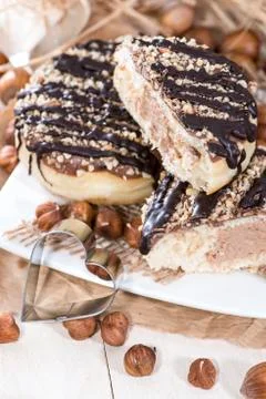 Fresh made hazelnut donuts Stock Photos