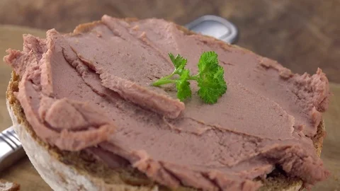 Fresh made Liverwurst (not loopable; 4K) Stock Footage