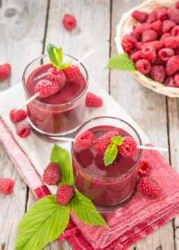 Fresh made raspberry juice Stock Photos