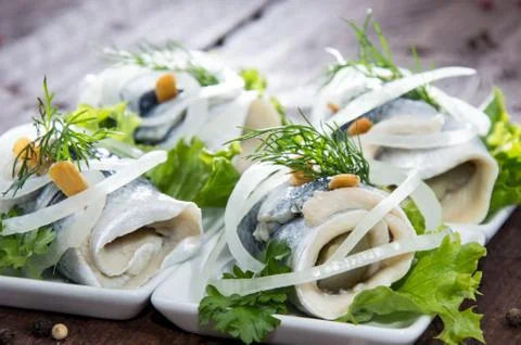 Fresh made rollmop on a plate Stock Photos