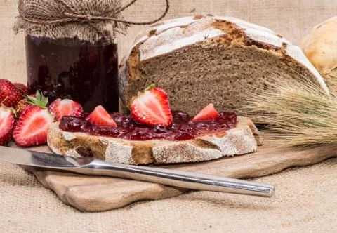Fresh made strawberry jam on bread Stock Photos