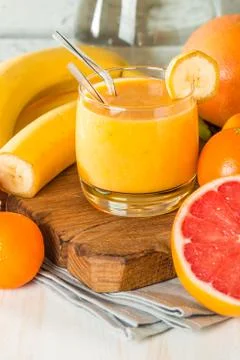 Fresh made yellow smoothie Stock Photos