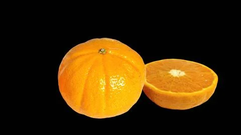 Fresh mandarin orange with half slice on black background. Stock Photos